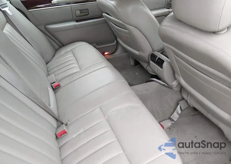 2004 Lincoln Town Car Signature z USA, uszkodzony, nr VIN 1LNHM81W74Y666042